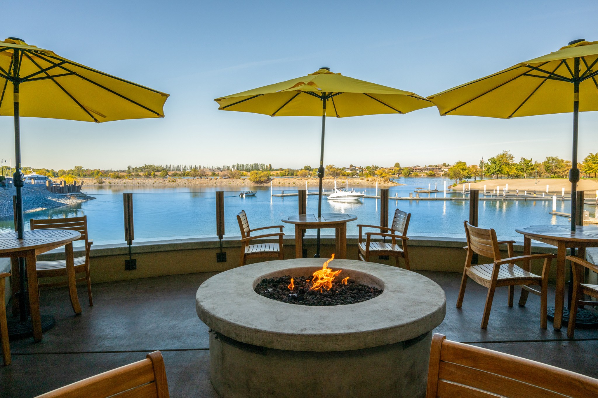 The Lodge at Columbia Point overlooking the Columbia River—inviting architecture with warm lighting, riverside views, and elegant yet relaxed ambiance near the River Walk.
